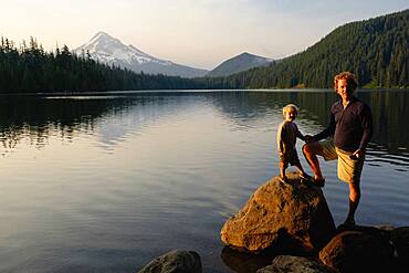 Caucasian father and son standing by Lost Lake, Hood River, Oregon, United States