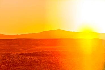 Sunset over desert landscape