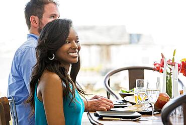 Couple smiling at dining room table