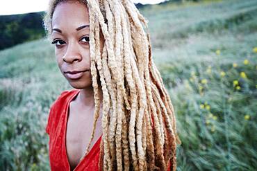 Black woman walking in field