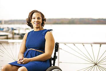 Disabled woman smiling in wheelchair