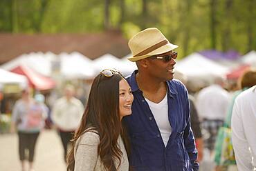 Couple shopping at farmers market