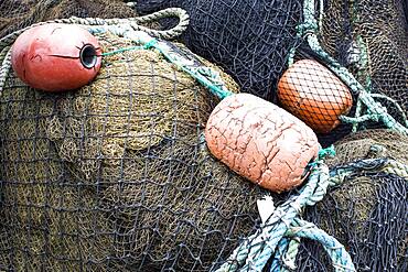 Close up of fishing net and buoys