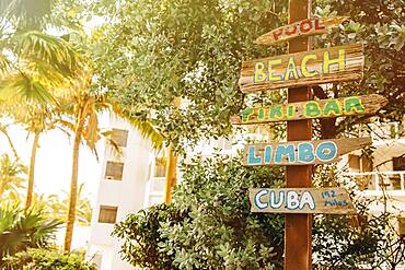 Tourist signs for beach and pool