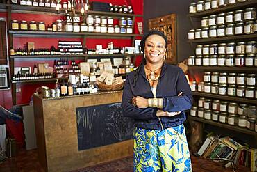 Black woman smiling in tea shop