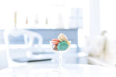 Variety of macaroon cookies in glass