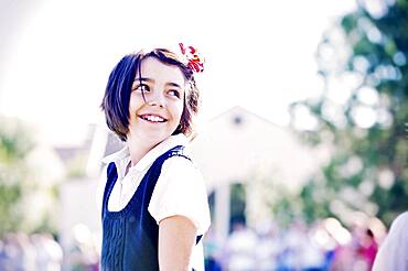 Mixed race girl smiling outdoors