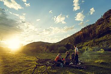 Caucasian friends in rural field