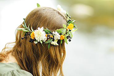 Close up of Middle Eastern woman wearing flower crown