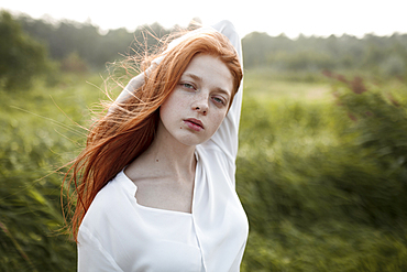 Close up of wind blowing hair of Caucasian woman