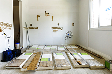 Packages of flooring on floor