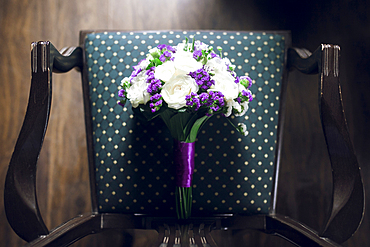 Bouquet of flowers on chair