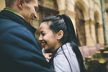 Close up of Caucasian couple laughing