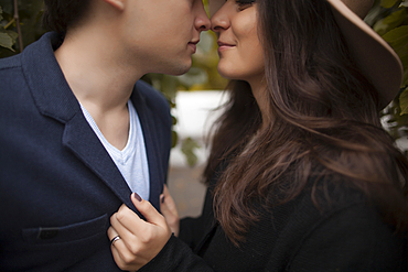 Caucasian couple rubbing noses