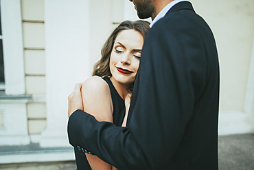 Portrait of smiling Caucasian couple hugging