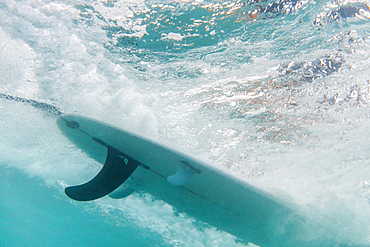 Underwater view of surfboard