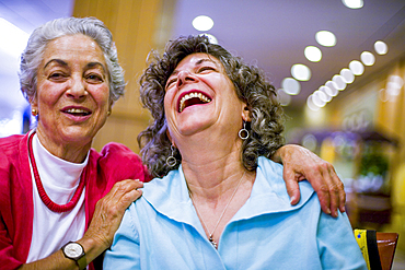 Caucasian women laughing