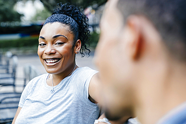 Black woman laughing with man