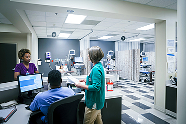 Doctor and nurses talking in hospital