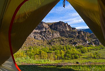 Scenic view of mountain from inside tent