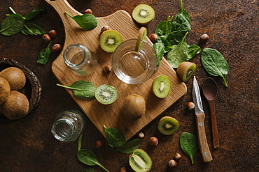 Sliced kiwi on cutting board