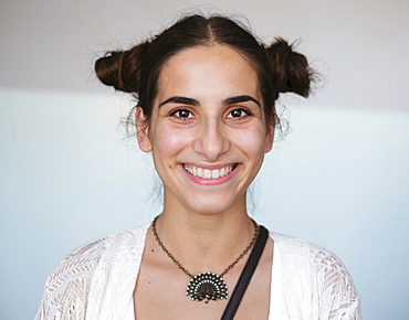 Portrait of smiling Caucasian woman wearing necklace