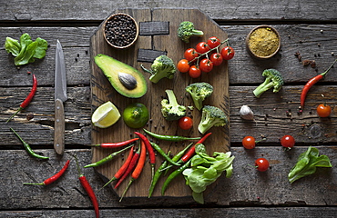 Sliced fruit and vegetables on cutting board