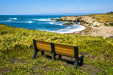 Bench overlooking ocean cove