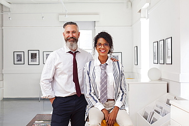 Portrait of smiling businessman and businesswoman