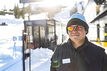 Portrait of smiling man outdoors in snow