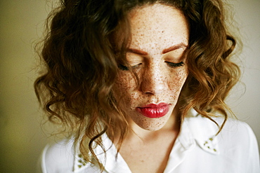 Close up of Mixed Race woman looking down