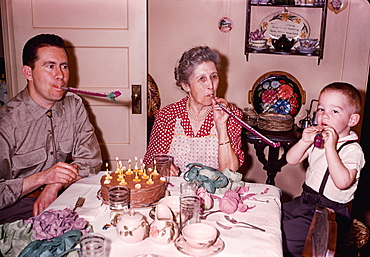 Multi-generation family celebrating birthday