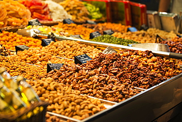 Bins of nuts at market