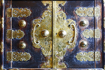 Ornate handles on doors