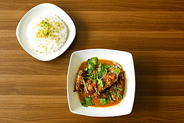 Rice and meat in bowls