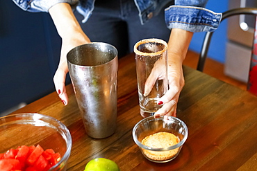 Woman preparing cocktail