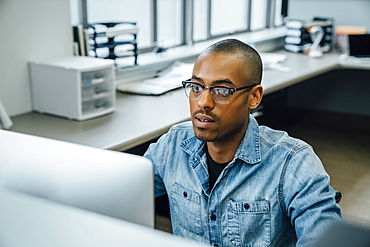 Black businessman using computer