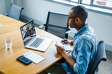 Business people on video conference