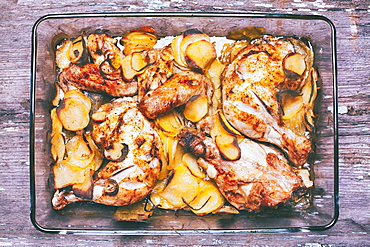 Potato and chicken casserole in baking dish