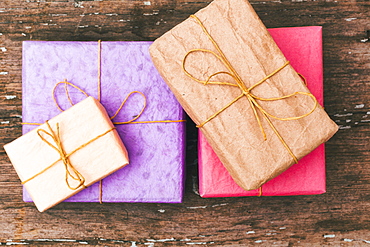 Wrapped gifts on wooden table