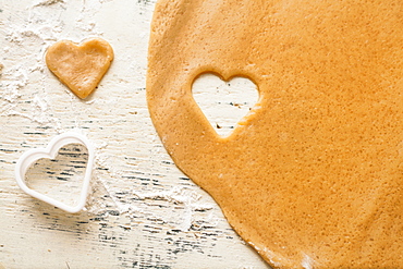 Heart shape cut from cookie dough