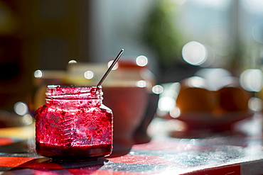 Spoon in jar of jam