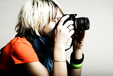 Close up of Caucasian teenage girl photographing with camera