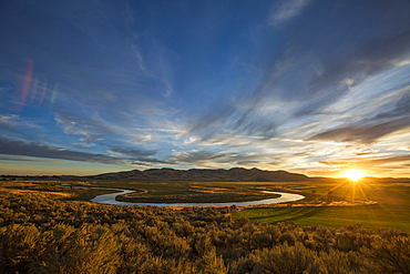 Sunset over winding river