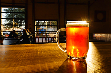 Glass of beer on counter