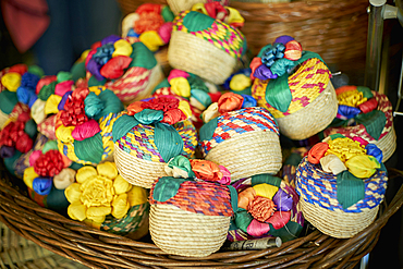 Multicolor trinkets in basket