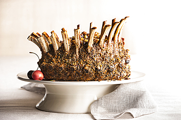 Stuffed lamb crown roast on tray