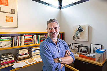 Portrait of smiling Caucasian man in home office