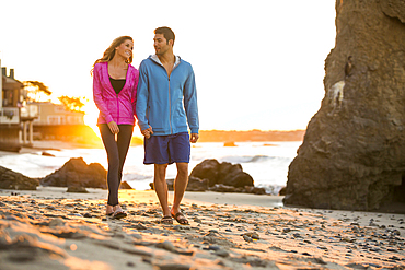 Couple walking on beach