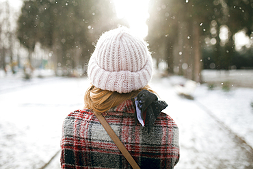 Rear view of Caucasian woman outdoors in snow